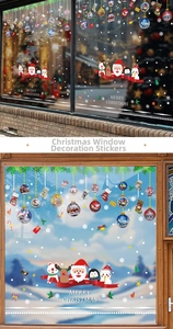 Detail view of colorful Merry Christmas static stickers featuring Santa, penguin and reindeer