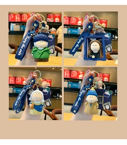 Artistic masterpiece keychains featuring cartoon Van Gogh and Mona Lisa with blue wristlets