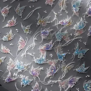 Macro detail of M-516 aurora butterfly nail stickers with 3D embossed iridescent finish
