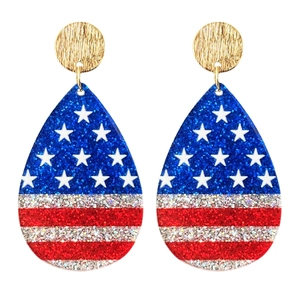 Macro detail of teardrop earrings with American flag glitter texture and gold studs
