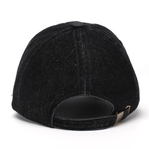 Detail view of denim baseball cap showing the vintage metal buckle and adjustable back strap