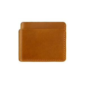 Detail of vintage brown crazy horse leather card holder with contrast orange stitching