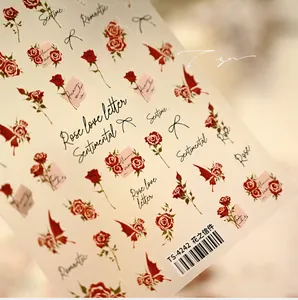 Detail of TS-4242 nail stickers featuring vintage roses, black ribbons and artistic letters