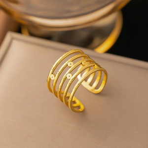 Minimalist gold-plated multilayer open ring with four bands and delicate circular dot details