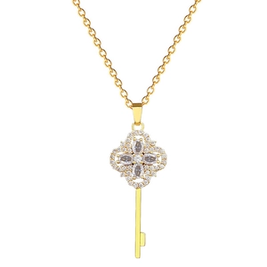 Elegant gold clover key necklace with sparkling crystals on a minimalist chain