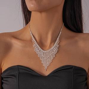 Elegant silver tassel fringe necklace with sparkling rhinestones for party wear