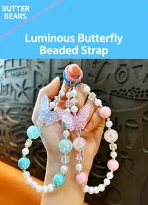 Close-up view of creative luminous butterfly beaded phone chain keychain bag pendant charms