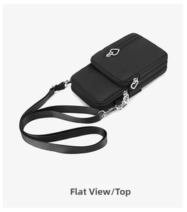 Detail of black nylon crossbody phone bag with double zippers and heart-shaped pulls