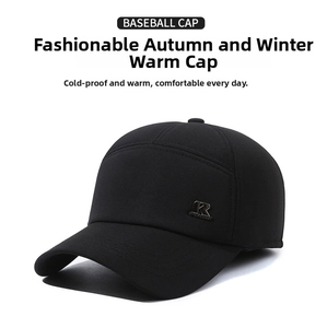 Close-up of black winter baseball cap with warm knit texture and metal R letter detail