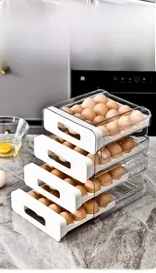 Macro detail of a 4-tier transparent egg drawer organizer for refrigerator storage