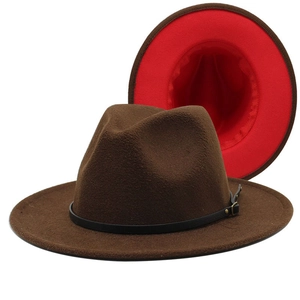 Detail showing dark brown wool fedora with red interior lining and leather belt buckle