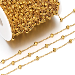 Golden stainless steel wave bead chain on white spool for DIY jewelry making