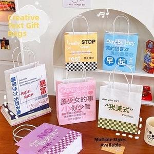 Macro shot of colorful checkered gift bags with handles in bright lifestyle setting