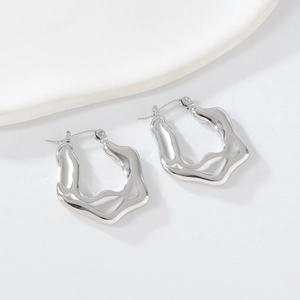 Polished silver geometric wave earrings in a minimalist stainless steel style