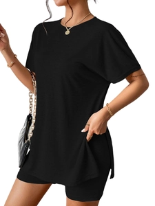 Detail of black oversized batwing sleeve t-shirt and matching casual shorts for women