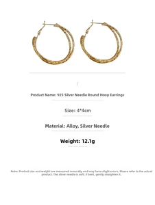 Detail view of gold textured cross hoop earrings with 925 silver needles and dimensions