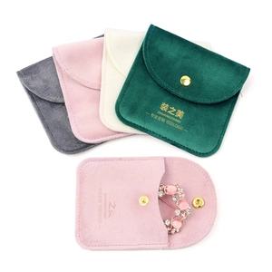 Premium velvet jewelry pouches with snap buttons for rings and necklaces in four colors