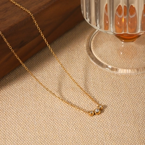18K gold plated stainless steel necklace with three bezel-set cubic zirconia pendants