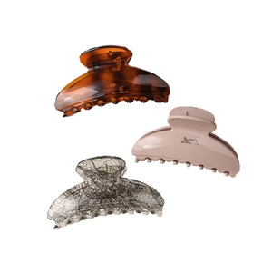 Three-piece set of elegant hair claws in amber, beige, and black lace pattern