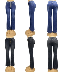 Detail view of high-waist denim jeans with five-button closure and flared leg design