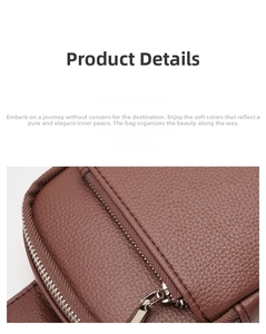 Detail of premium brown pebble grain leather surface and durable metal zipper on bag