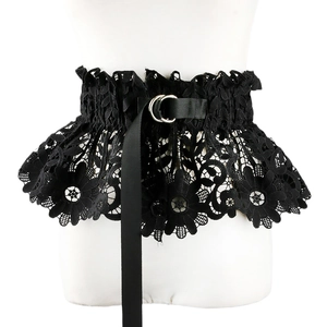 Detailed view of black floral lace waist belt with silver double rings and satin ribbon