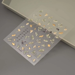 Golden ginkgo leaf and swallow 5D nail art stickers with metallic gold foil finish