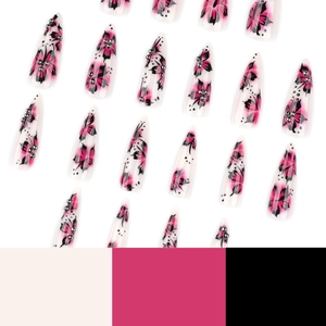 Extra long stiletto press-on nails featuring floral art and metallic bead accents