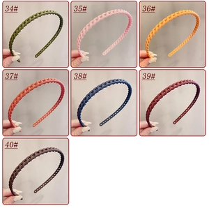 Close-up of woven texture headbands in seven Morandi colors with non-slip jagged design
