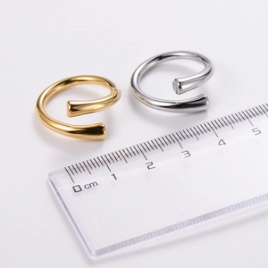 Polished titanium steel spiral open ring set in gold and silver finish with size ruler