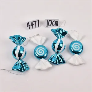 Detailed view of four 10cm blue metallic Christmas candy cane ornaments with white glitter