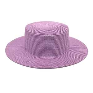 Elegant purple flat top straw sun hat for outdoor beach travel and summer fashion