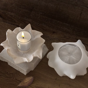 Detail of translucent petal-shaped resin tray with frosted texture for jewelry storage