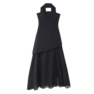 Close-up of black halter neck dress with dual-layered chiffon hem and high waist design