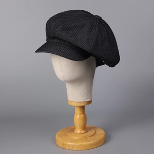 Classic black wool octagonal newsboy hat with a retro cloud design for casual autumn styling