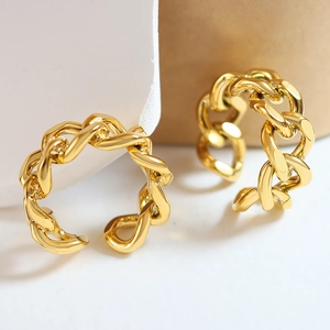 Polished gold curb chain hoop earrings in a minimalist industrial design for women