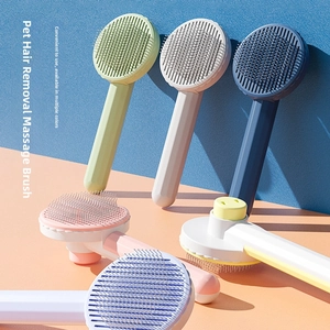 Detail view of colorful self-cleaning pet grooming brushes in five pastel color options
