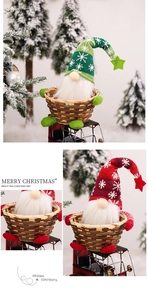 Detail of Christmas gnome with knitted snowflake hat sitting in a round bamboo candy basket