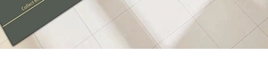 Close-up of minimalist kitchen mat edge on tile floor with modern typography