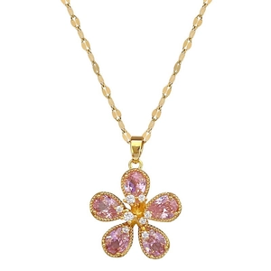 Luxurious gold-tone flower necklace and earrings set with pink stones and clear crystals