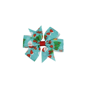 Detail der Weihnachts-Haarschleife mit Weihnachtsmann- und Lebkuchenmann-Mustern auf Band