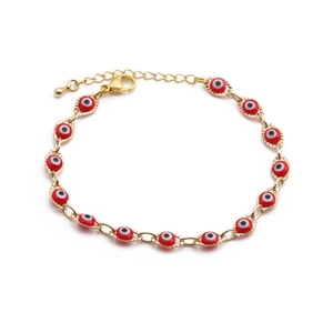 Gold plated evil eye bracelet with red enamel oval charms and adjustable link chain