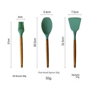 Detailed view of mint green silicone brush, spoon and turner with dimensions and weight