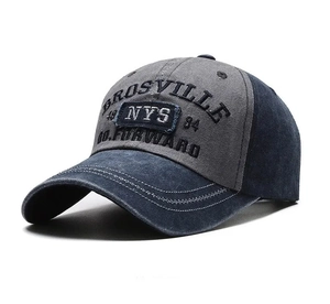 Close-up of NYS embroidery and reinforced stitching on washed cotton baseball cap