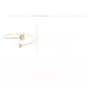 Detail of sun and moon open cuff bracelet with micro-pave rhinestones and gold finish