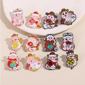 Set of 12 cartoon Year of the Snake enamel pins with traditional lunar motifs