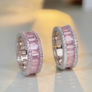 Sparkling S925 sterling silver ring featuring pink step-cut diamonds and side pavé detailing