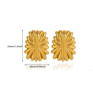 Detail view of gold flower stud earrings with dimension labels 33mm by 24mm