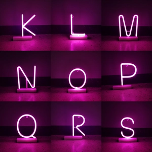 Pink LED neon alphabet letters K to S with base for festive bar and home atmosphere decoration