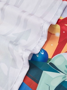Detailed macro view of white satin stripe texture and festive Christmas snowman print